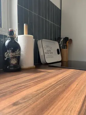 a counter top with toilet paper and a toaster at Le p’tit bonheur-Piscine chauffée-clim-Park in Carpentras