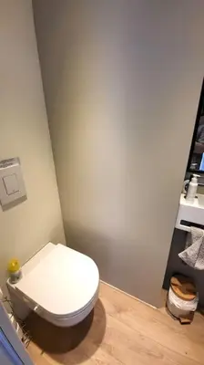 a bathroom with a white toilet in a room at LOU BRISOU in Saint-Saturnin-les-Apt