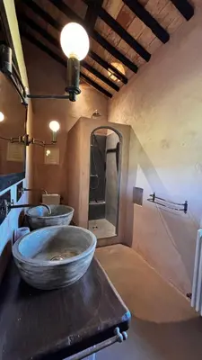 a bathroom with two large sinks in a room at Le Mas de Bonnety - Magnifique mas 12 personnes au Pied du Mont Ventoux in Saint-Pierre-de-Vassols