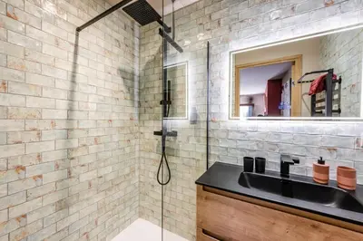 a bathroom with a sink and a shower at KM2 in Bédoin