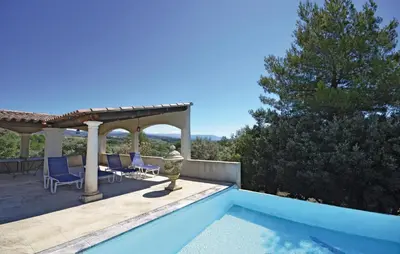 a house with a swimming pool and a gazebo at Awesome Home In Joucas With Kitchen in Joucas