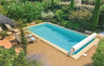 an overhead view of a pool with a water slide at Amazing Home In Saint Remy De Provence in Saint-Rémy-de-Provence