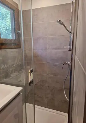 a shower with a glass door in a bathroom at Chalet du Mont Ventoux - Rendez-vous en Provence in Bédoin