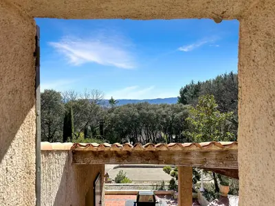 a view from a window of a house with trees at Villa Edelweiss in Lauris