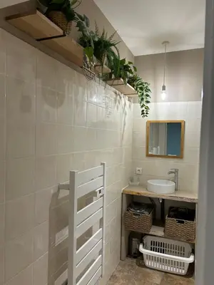 a bathroom with a sink and a mirror at Détours en Provence - Lavande 3* in Châteaurenard