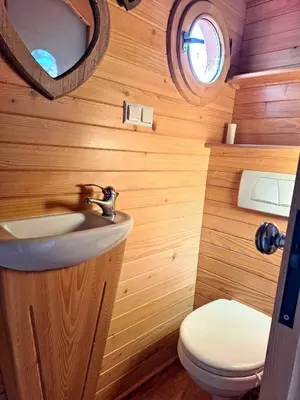 a bathroom with a sink and a toilet at Villa élégante à Lambesc avec spa in Lambesc