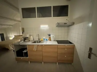 a kitchen with a sink and a counter top at Carpentras cosy& 3 voyageurs& in Carpentras