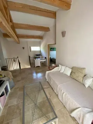 a bedroom with a bed and a glass table at Le bon Vivre in Aix-en-Provence