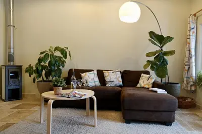 a living room with a couch and a coffee table at La Grisonne - Gîte Camus in Revest-du-Bion