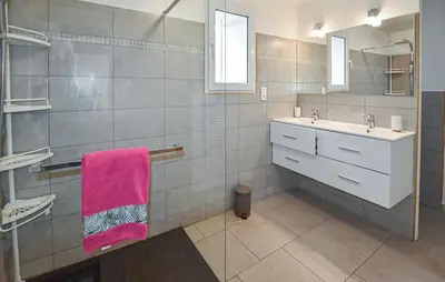 a bathroom with a sink and a pink towel at Les Romarins dans le Mas de la PERRINE entre AVIGNON LUBERON Mt VENTOUX in Monteux