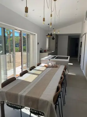 a large dining room with a long table and chairs at Magnifique Mas avec Piscine Luberon (Gordes) in Murs