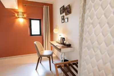 a room with a desk and a chair in a room at Château la Beaumetane in Lançon-Provence
