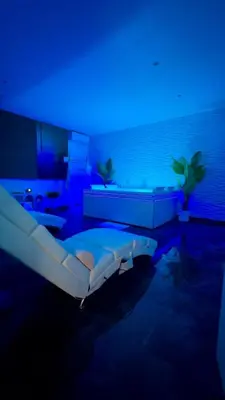 a bathroom with a sink and a mirror at DIMA SUITE Jacuzzi Privatif in Vedène