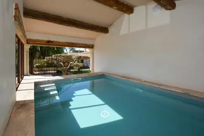 a swimming pool in a house at St REMY AILLEURS in Noves
