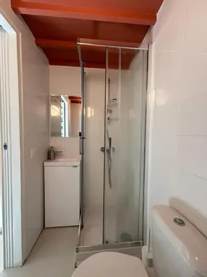 a bathroom with a shower and a toilet at Studio Cosy au cœur d’Aix et & Cours Mirabeau in Aix-en-Provence