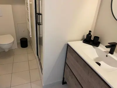 a bathroom with a sink and a shower at UN DOUX MOMENT in Pernes-les-Fontaines