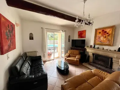 a living room with leather furniture and a fireplace at Provence Gîte de caractère à MONTEUX entre AVIGNON LUBERON Mt VENTOUX in Monteux