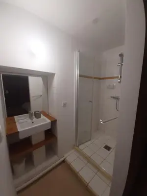 a bathroom with a shower and a sink at Mas des Grialou, grand mas provencal de standing in Carpentras