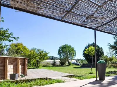 a pavilion with a shed and a field at Holiday Home L' amandier by Interhome in Saint-Didier