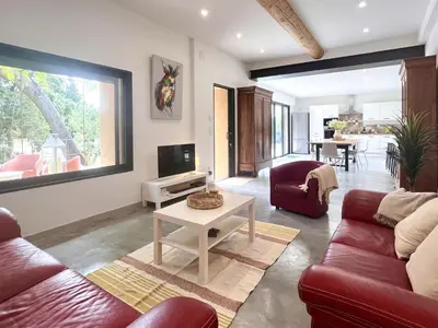 a living room with two couches and a tv at Villa du Tallagard in Salon-de-Provence