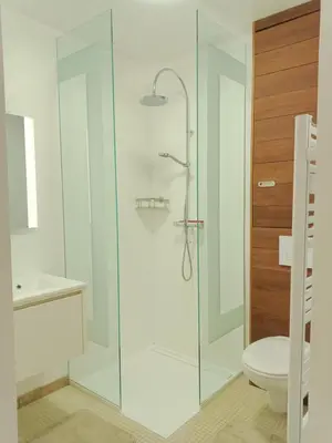 a bathroom with a shower with a toilet and a sink at Villa Lambesc Provence in Lambesc