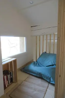 a bedroom with a bunk bed and a window at Maison avec terrasse panoramique in Châteauneuf-de-Gadagne