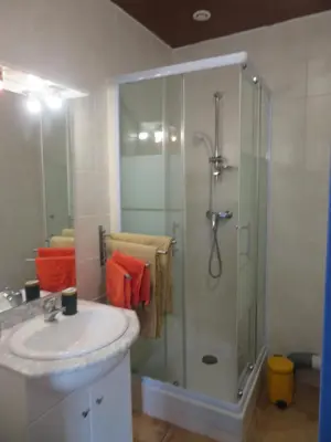 a bathroom with a sink and a shower at Auberge de la petite casserole in Revest-des-Brousses