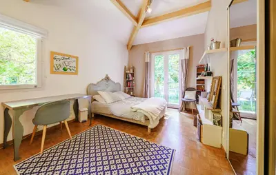 a room with a desk and a bed in it at Cozy Home In Aix-En-Provence With Wifi in Aix-en-Provence