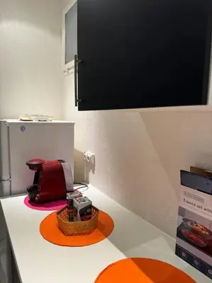 a camera sitting on a counter in a kitchen at Le Tanneur- Grand Studio 38m2 en centre-ville in Aix-en-Provence