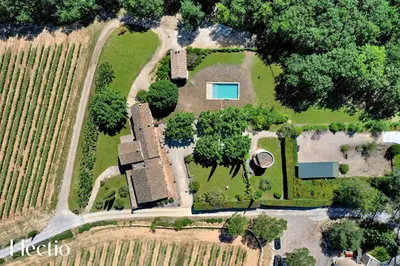 an aerial view of an estate with trees and a field at Bastide Domaine Tour Campanets in Le Puy-Sainte-Réparade
