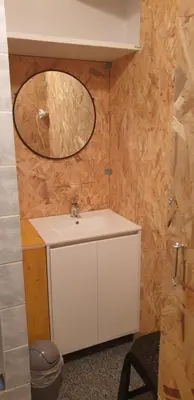a bathroom with a white sink and a mirror at Chambre étudiant in Morières-lès-Avignon