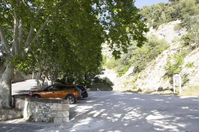 a car parked on the side of a road at Les trois gites in Robion en Luberon