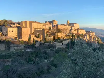a city with a bunch of buildings on a hill at Havre de paix sur Roussillon in Roussillon
