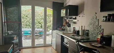 a kitchen with a sink and a counter top at Appartement à La Bastidonne in La Bastidonne