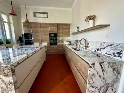 a kitchen with marble countertops and a large kitchen island at Divine Idylle Luxe 3 chambres, terrasse 130m2, jacuzzi, Clim 5 m Cours Mirabeau in Aix-en-Provence