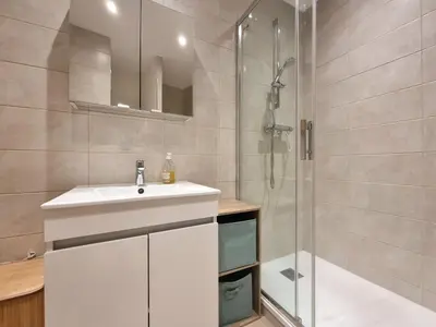 a bathroom with a white sink and a shower at Studio centre historique 2 in Aix-en-Provence