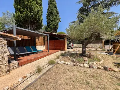 a house with a tree in the yard at Mazet des Balestiés cœur Luberon 120 m2 6 pers avec piscine in Gargas