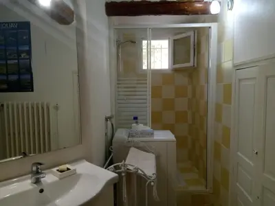 a bathroom with a sink and a shower at la bastide aux buis avec piscine in Blauvac