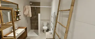 a bathroom with a toilet and a glass shower at Appartement dans mas avec piscine privée sans vis a vis in Miramas