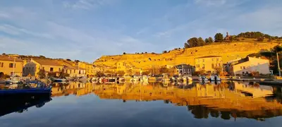 a view of a harbor with boats in the water at Appartement dans mas avec piscine privée sans vis a vis in Miramas