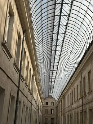 a large building with a large glass ceiling at Bel appartement en plein cœur de Carpentras in Carpentras