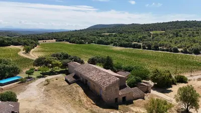 an aerial view of a house in a field at Domaine Camp Fourca in Mirabeau