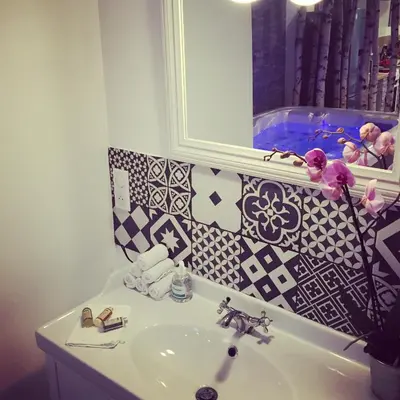 a bathroom with a sink and a mirror at Domaine entier au havre de paix 4 chambres in Vauvenargues