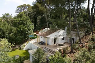 an overhead view of a white house in the woods at Villa La Pinède in Aix-en-Provence