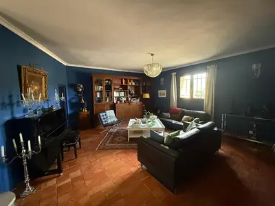 a living room with a couch and a table at Moulin AURELIA in La Barben