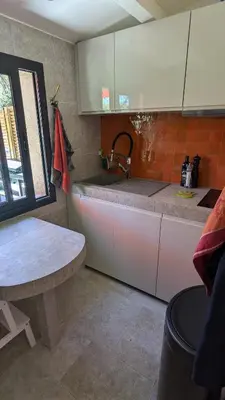 a kitchen with a sink and a counter top at Studio climatisé - Terrasse, Plancha, Fibre in Aix-en-Provence