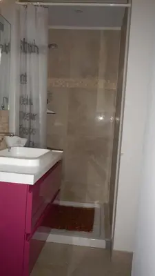 a bathroom with a sink and a shower at le gîte Lou Jas in Eyragues