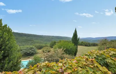 a view of a garden with a swimming pool at Stunning Home In Vacheres in Vachères