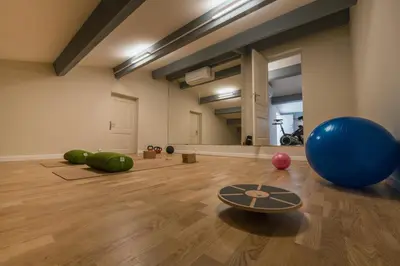 an empty room with a gym with a large exercise ball at Mas Naste in Eygalières