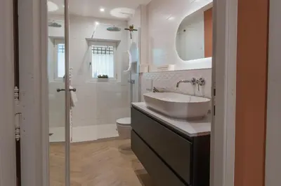 a bathroom with a sink and a toilet at Mas Naste in Eygalières